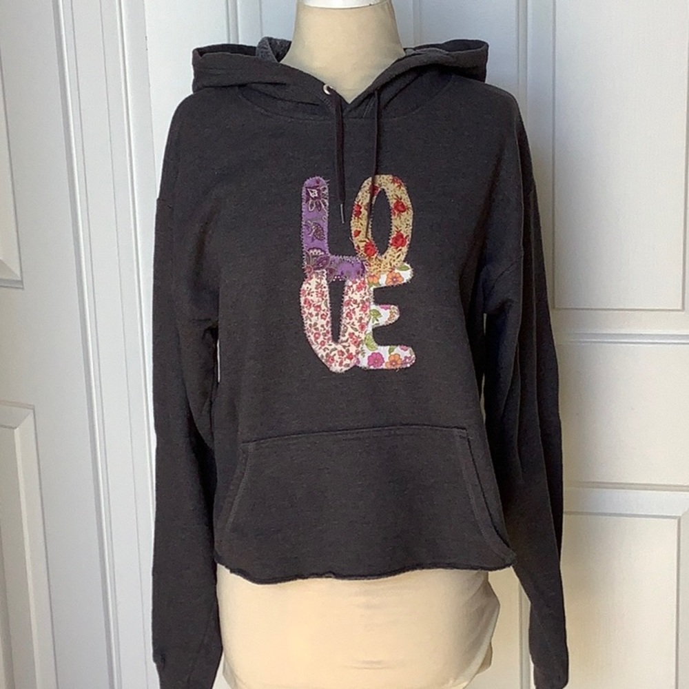 Hanes upcycled charcoal gray hoodie, with “Love” hand appliqué.